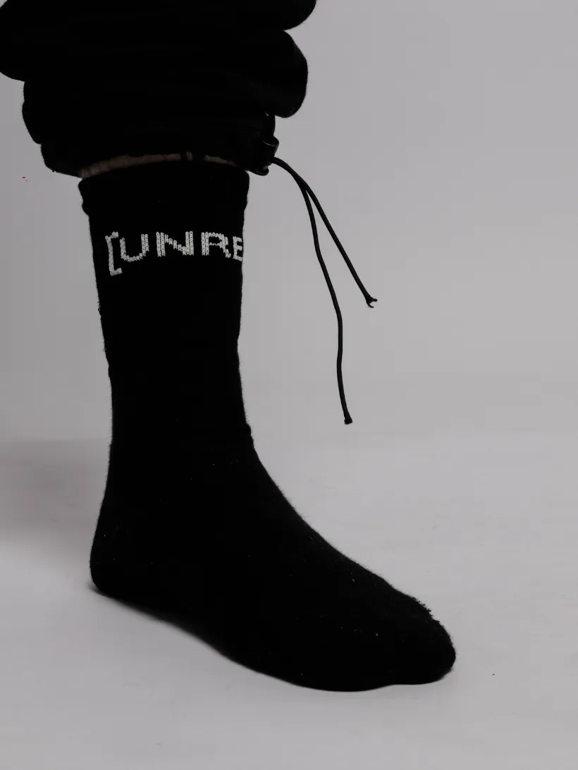 Status symbol black socks